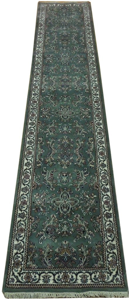 3 x 11 Basil Green Sarouk Runner Rug: 3 x 11 Basil Green Sarouk Runner Rug Free continental US Shipping Size in Feet: Width: 3 x Length: 11 Size in Inches: Width: 36 in x Length: 132 in Colors: Basil Green Ivory Weave: 100% Handmade Pile: