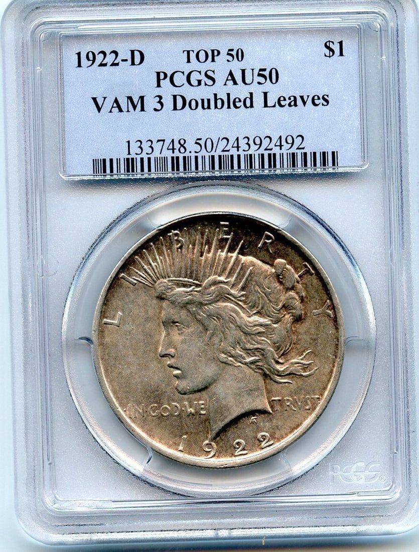 C7102- 1922-D VAM-3 DOUBLED LEAVES TOP 50 PEACE DOLLAR PCGS AU50: C7102- 1922-D VAM-3 DOUBLED LEAVES TOP 50 PEACE DOLLAR PCGS AU50 Certification: PCGS Grade: AU50 Circulated/Uncirculated: Circulated Pre-Owned The MYNT Guarantee: All items in this auction are guarant