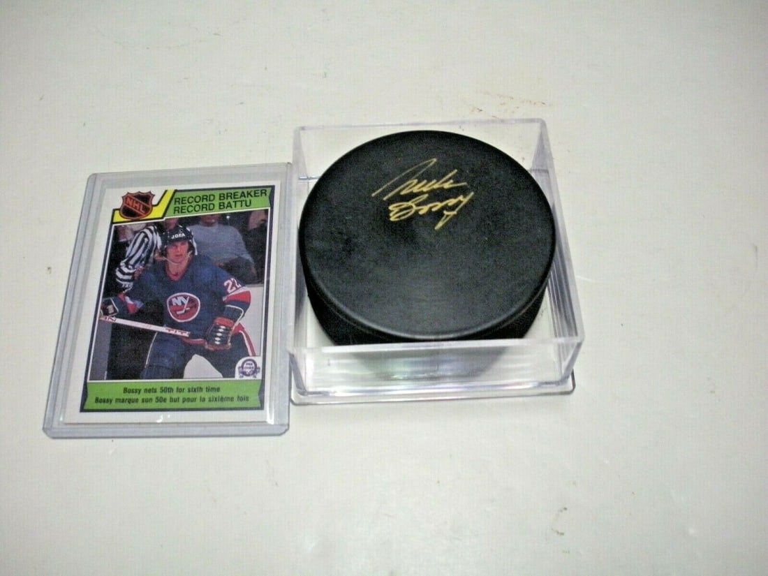 MIKE BOSSY NEW YORK ISLANDERS HOF 1991 DECEASED W/COA SIGNED HOCKEY PUCK: MIKE BOSSY NEW YORK ISLANDERS HOF 1991 DECEASED W/COA SIGNED HOCKEY PUCK Product: Puck Product Type: Pucks Sport: Hockey-NHL Original/Reprint: Original Pre-Owned While the lot images are representativ