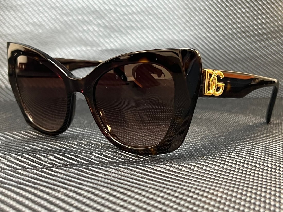 DOLCE & GABBANA DG4405 502 13 Havana Butterfly 53 mm Womens Sunglasses: DOLCE & GABBANA DG4405 502 13 Havana Butterfly 53 mm Womens Sunglasses Type: Sunglasses Frame Color: Brown Style: Butterfly New The Mynt Guarantee: All items in this auction are guaranteed to be 100% 