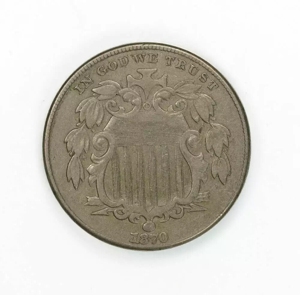 1870 SHIELD NICKEL 5C XF EXTRA FINE / AU ABOUT UNCIRCULATED (6764): 1870 SHIELD NICKEL 5C XF EXTRA FINE / AU ABOUT UNCIRCULATED (6764) Certification: Uncertified Composition: Nickel Year: 1870 Circulated/Uncirculated: Unknown Strike Type: No Grade Mint Location: PHILA