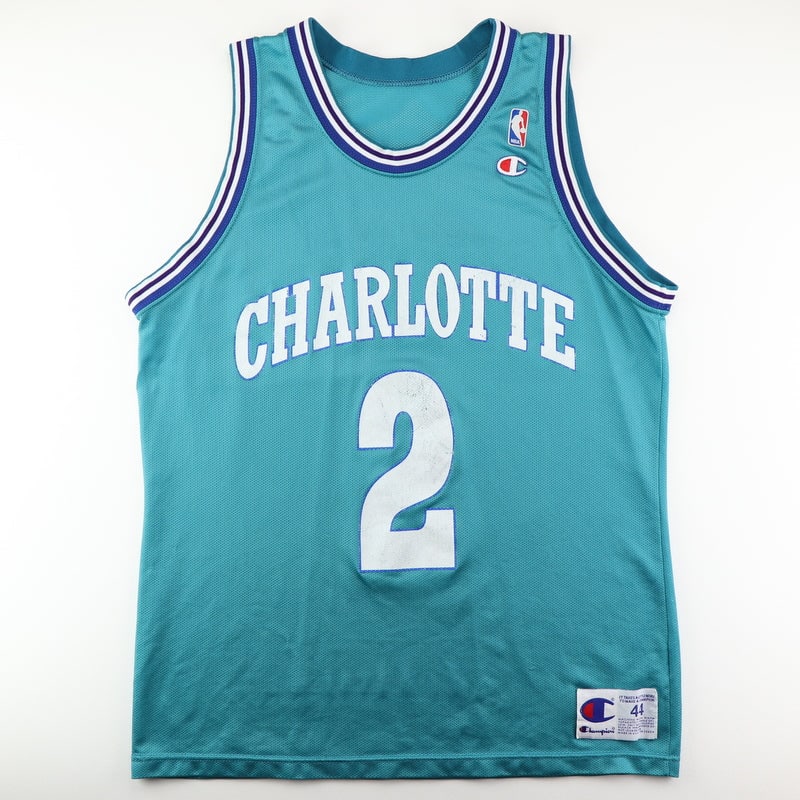 1990s Larry Johnson Charlotte Hornets Basketball Jersey: 1990s Larry Johnson Charlotte Hornets Basketball Jersey Original 1990s Larry Johnson Charlotte Hornets Basketball Jersey. This is a true vintage jersey, not a modern reproduction. Sizes vary so please
