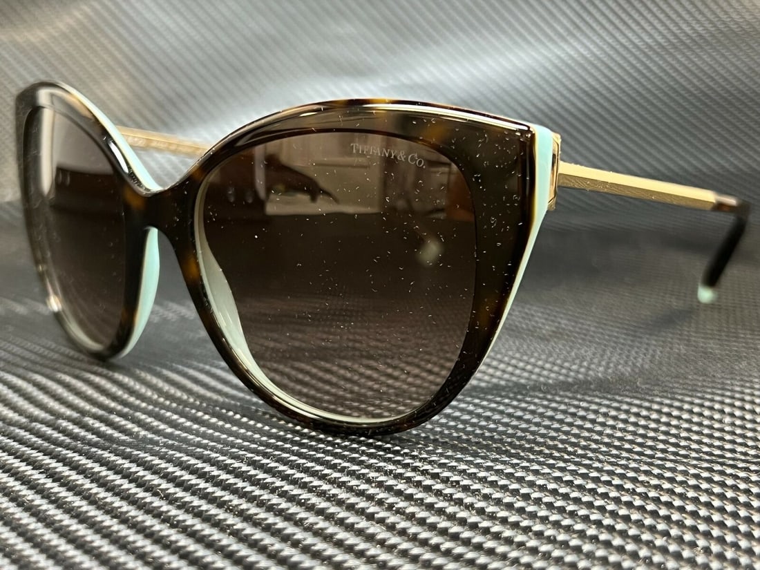 TIFFANY TF4166 81343B Havana Cat Eye Womens 55 mm Sunglasses: TIFFANY TF4166 81343B Havana Cat Eye Womens 55 mm Sunglasses Type: Sunglasses Frame Color: Beige Style: Cat Eye New The MYNT Guarantee: All items in this auction are guaranteed to be 100% authentic. A