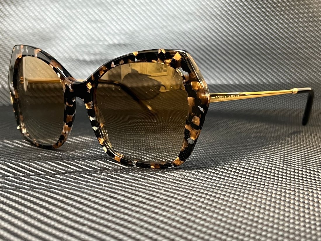 DOLCE & GABBANA DG4399 911 6E Cube Black/Gold Butterfly 56 mm Womens Sunglasses: DOLCE & GABBANA DG4399 911 6E Cube Black/Gold Butterfly 56 mm Womens Sunglasses Frame Color: Beige Style: Butterfly Type: Sunglasses New The MYNT Guarantee: All items in this auction are guaranteed to