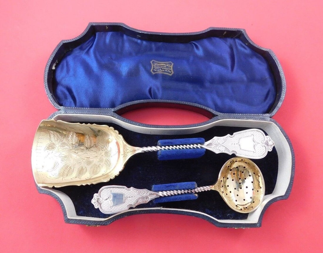 Coin Silver Fruit Set 2pc in Fitted Box Fruit Scoop and Sugar Sifter Gold Washed: Coin Silver Fruit Set 2pc in Fitted Box Fruit Scoop and Sugar Sifter Gold Washed Composition: Coin Silver Age: 1850-1899 Pattern: Unknown Type: Fruit Set Coin silverearly coin silver fruit set 2-piece