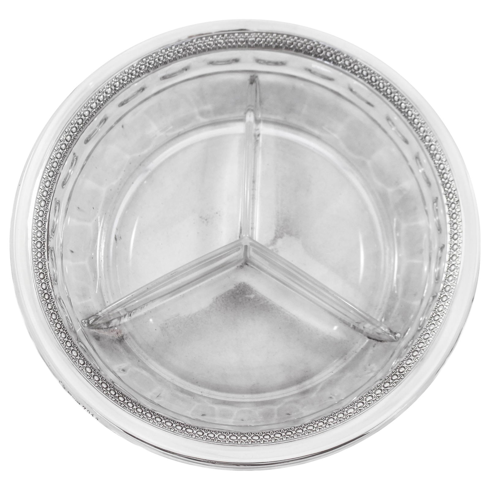 Sterling and Crystal Sectional: Sterling and Crystal Sectional Dimensions: Height: 2 in (5.08 cm)Diameter: 7.5 in (19.05 cm) Materials and Techniques: Glass Sterling Silver Place of Origin: United States Period: 1930-1939 Date of Ma