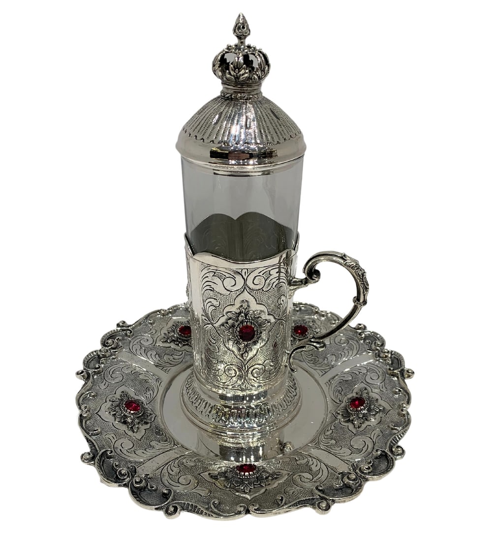 FINE 925 STERLING SILVER & GLASS & RED STONE HANDMADE CHASED TEA CUP & TRAY: FINE 925 STERLING SILVER & GLASS & RED STONE HANDMADE CHASED TEA CUP & TRAY Composition: Sterling Silver Maker: Made in Turkey Fine 925 Sterling Silver Tea Cup with Handle & Tray. Featuring handmade c