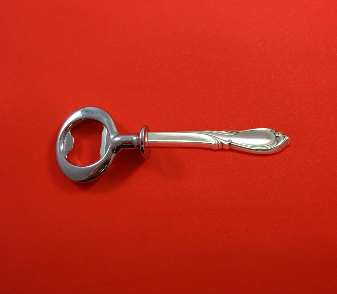 Rhapsody New by International Sterling Silver Bottle Opener HH Custom Made 6": Rhapsody New by International Sterling Silver Bottle Opener HH Custom Made 6" Composition: Sterling Silver / Chrome Plating Maker: International Type: Bottle Opener Age: Post-1940 A pleasing harmony o