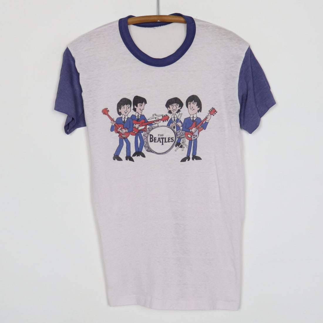 1970s The Beatles Cartoon Shirt: 1970s The Beatles Cartoon Shirt Original 1970s The Beatles Cartoon Shirt. This is a true vintage shirt, not a modern reproduction. Sizes vary so please use measurements for best idea on fit. No back g