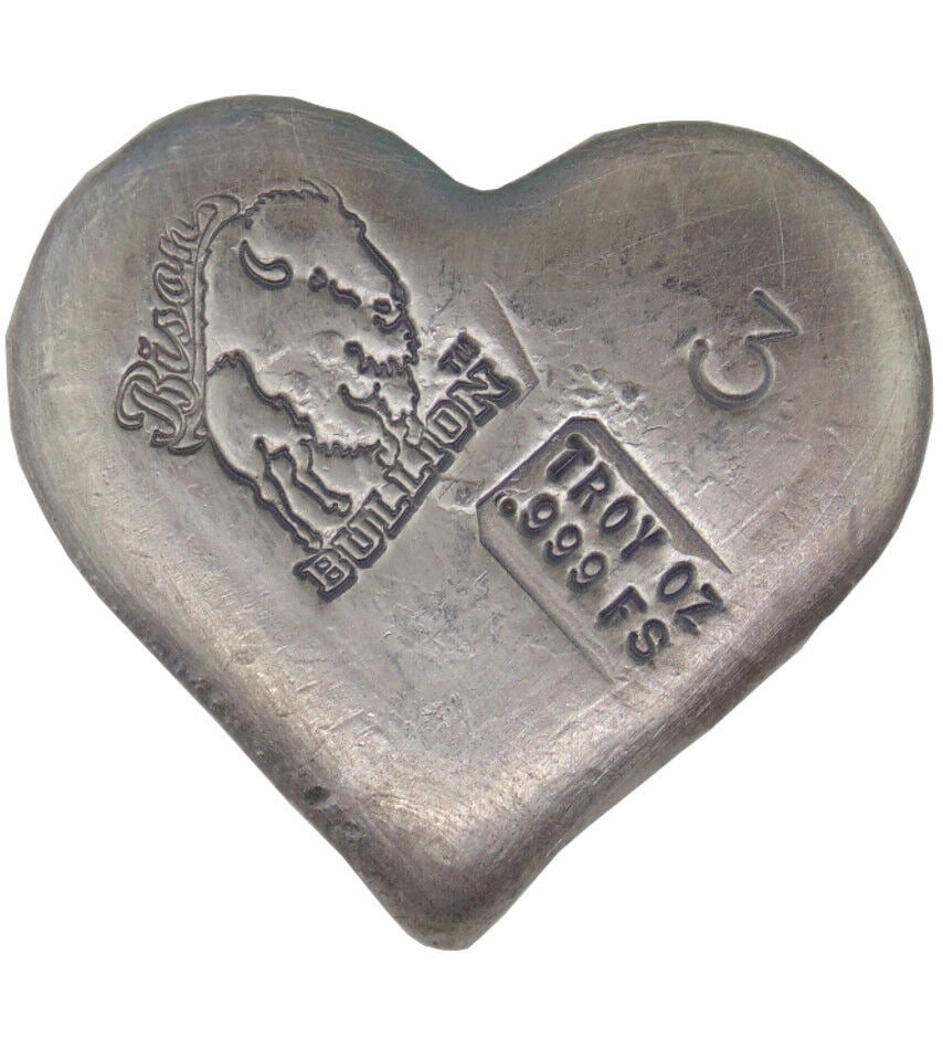 3 TROY OUNCE .999 FINE SILVER HAND POURED BISON BULLION FANCY BAR HEART: 3 TROY OUNCE .999 FINE SILVER HAND POURED BISON BULLION FANCY BAR HEARTPre-Owned The MYNT Guarantee: All items in this auction are guaranteed to be 100% authentic. At Your Service: At MYNT, our Custom