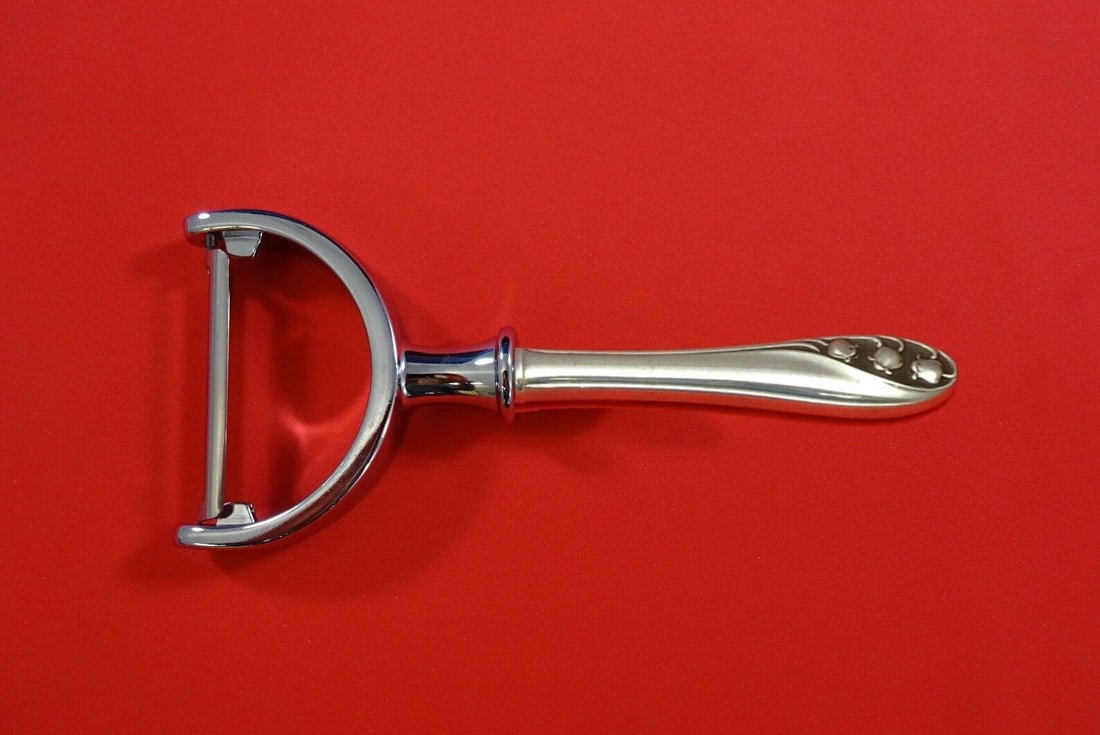 Lily of the Valley by Gorham Sterling Silver Vegetable Peeler HHWS Custom 6": Lily of the Valley by Gorham Sterling Silver Vegetable Peeler HHWS Custom 6" Composition: Sterling Silver Maker: Gorham Type: Vegetable Peeler Age: Post-1940 Lily of the valley by gorhamsterling silve
