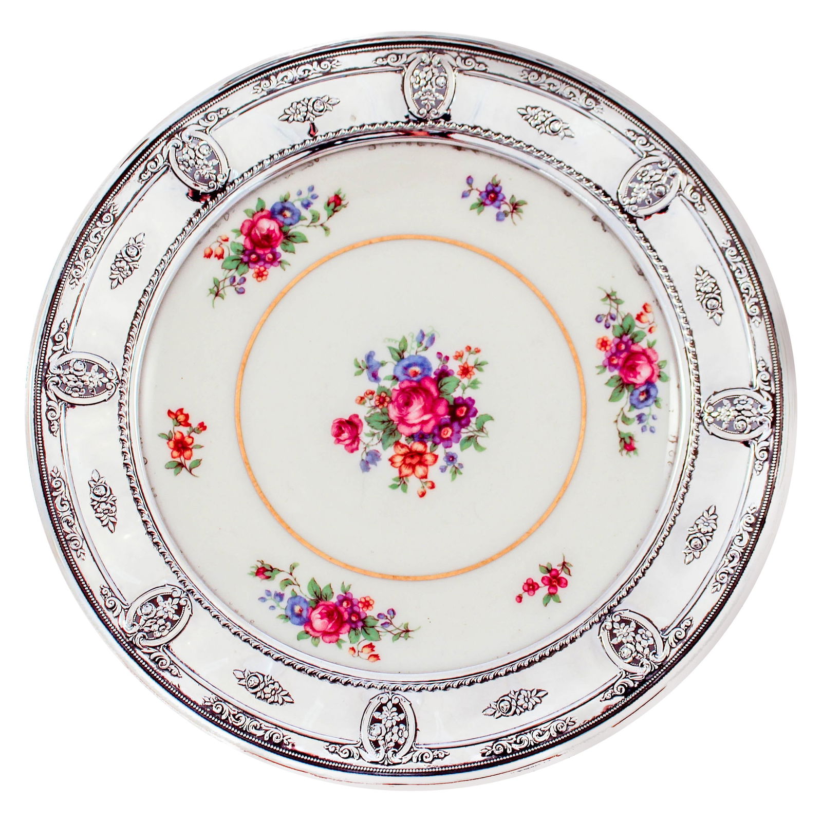 Sterling and Porcelain Dish: Sterling and Porcelain Dish Creator: Wallace Silversmiths (Manufacturer) Dimensions: Height: 1 in (2.54 cm)Diameter: 9 in (22.86 cm) Materials and Techniques: Porcelain Sterling Silver Place of Origin