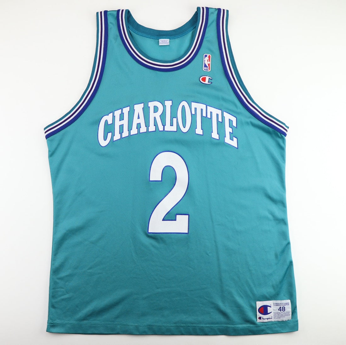 1990s Larry Johnson Charlotte Hornets Basketball Jersey: 1990s Larry Johnson Charlotte Hornets Basketball Jersey Original 1990s Larry Johnson Charlotte Hornets Basketball Jersey. This is a true vintage jersey, not a modern reproduction. Sizes vary so please