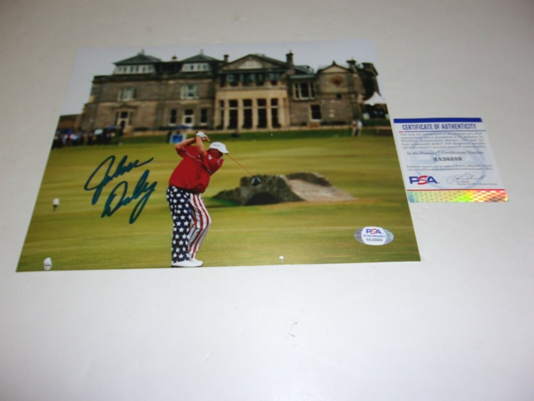 JOHN DALY GOLF LEGEND CIGARETTE N MOUTH USA PANTS PSA/DNA/COA SIGNED 8X10 PHOTO: JOHN DALY GOLF LEGEND CIGARETTE N MOUTH USA PANTS PSA/DNA/COA SIGNED 8X10 PHOTO Product: Photo Sport: Golf-PGA Original/Reprint: Original Pre-Owned While the lot images are representative of the item,