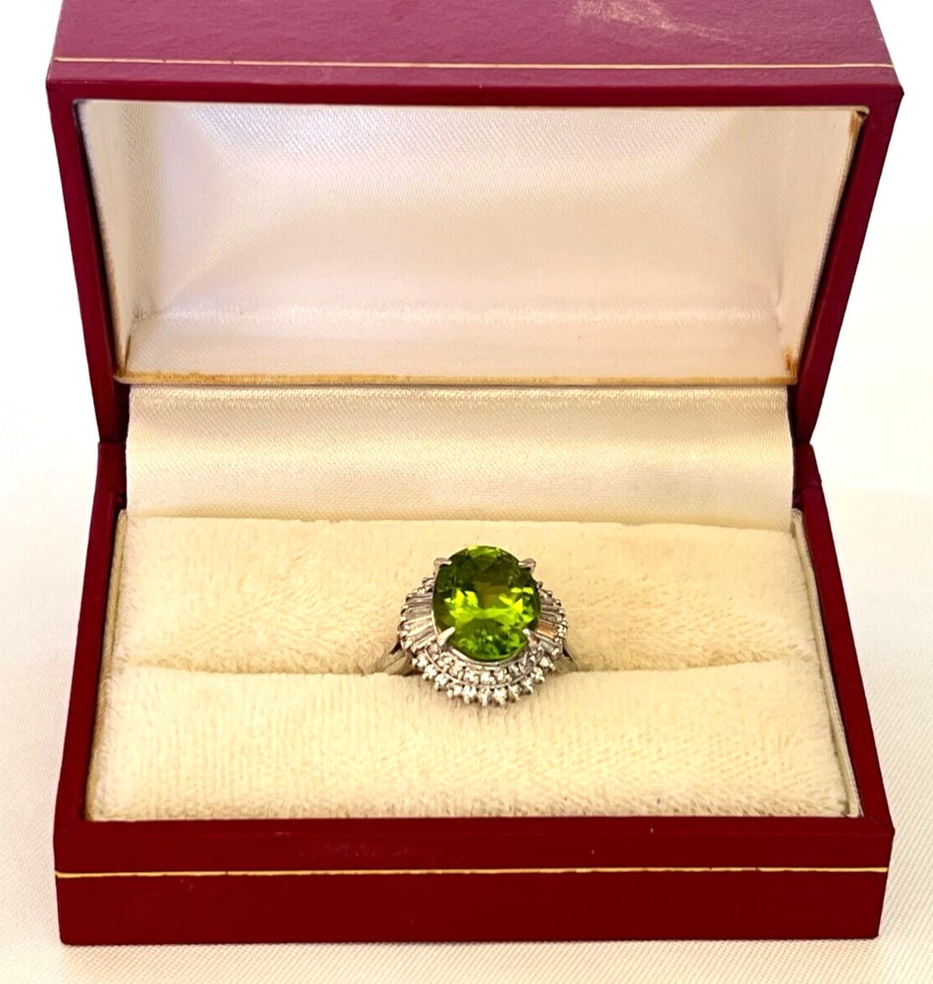 FRENCH PLATINUM PERIDOT DIAMOND RING SIZE 6: FRENCH PLATINUM PERIDOT DIAMOND RING SIZE 6 Ring Size: 6 Type: Ring Metal Purity: 900 Metal: Platinum Main Stone: DIAMOND PERIDOT It weights 8.80 grams and measures 1.25" tall 0.8" front and 0.65" wid