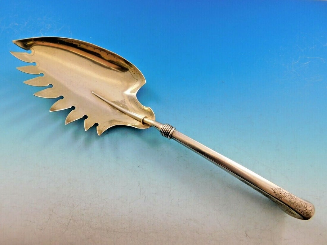 Angelo by Gorham Sterling Silver Macaroni Server Gold Washed 10 3/4": Angelo by Gorham Sterling Silver Macaroni Server Gold Washed 10 3/4" Type: Serving Pieces Age: 1850-1899 Composition: Sterling Silver Maker: Gorham Pattern: Angelo Angelo by gorhamcaptivating sterling