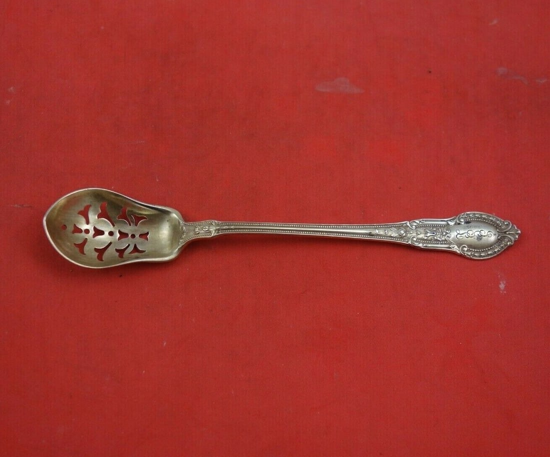 Tuileries by Gorham Sterling Silver Olive Spoon Gold Washed Pierced Orig 5 3/4": Tuileries by Gorham Sterling Silver Olive Spoon Gold Washed Pierced Orig 5 3/4" Maker: Gorham Composition: Sterling Silver Age: 1900-1940 Pattern: Tuileries Type: Serving Spoon Featured Refinements: S