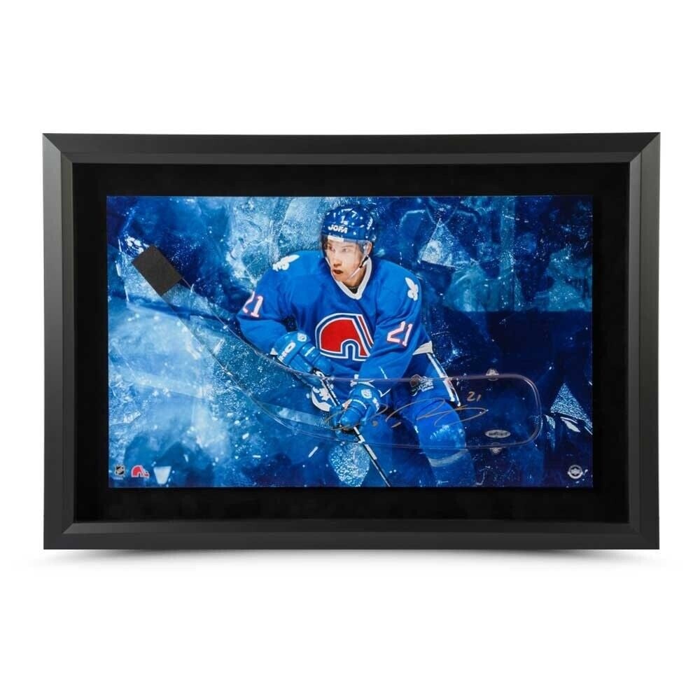 Peter Forsberg Autographed 17X25 Photo Framed Acrylic Stick Blade Nordiques UDA: Peter Forsberg Autographed 17X25 Photo Framed Acrylic Stick Blade Nordiques UDA Sport: Hockey Product: Photo Original/Reprint: Original Player: Peter Forsberg Team: Quebec Nordiques Autograph Authenti