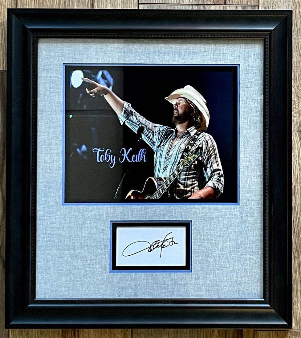 TOBY KEITH (Country Star-Red Solo Cup) signed 8x10 framed display-JSA: TOBY KEITH (Country Star-Red Solo Cup) signed 8x10 framed display-JSA Industry: Music Personalize: No Signed: Yes Autograph Authentication: James Spence (JSA) Original/Reproduction: Original None Whil