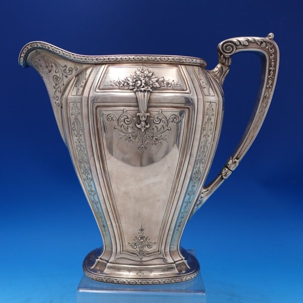D'Orleans by Towle Sterling Silver Water Pitcher #67150 9 3/4" Tall: D'Orleans by Towle Sterling Silver Water Pitcher #67150 9 3/4" Tall Pattern: D"Orleans Composition: Sterling Silver (.925) Type: Pitchers & Jugs Age: 1900-1940 Maker: Towle D'orleans by towlesuperb d'