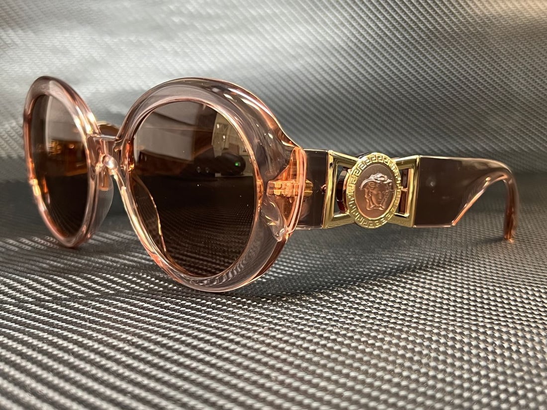 VERSACE VE4414 533973 Transparent Pink Round 55 mm Womens Sunglasses: VERSACE VE4414 533973 Transparent Pink Round 55 mm Womens Sunglasses Frame Color: Pink Style: Round Type: Sunglasses New The Mynt Guarantee: All items in this auction are guaranteed to be 100% authent