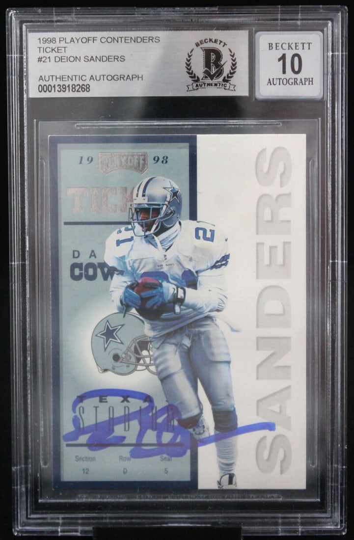1998 Playoff Contenders Ticket #21 Deion Sanders Dallas Cowboys BAS Autograph 10: 1998 Playoff Contenders Ticket #21 Deion Sanders Dallas Cowboys BAS Autograph 10Graded: NoSport: FootballPlayer/Athlete: Deion SandersManufacturer: Playoff Contenders TicketSeason: 1998Features: Autog