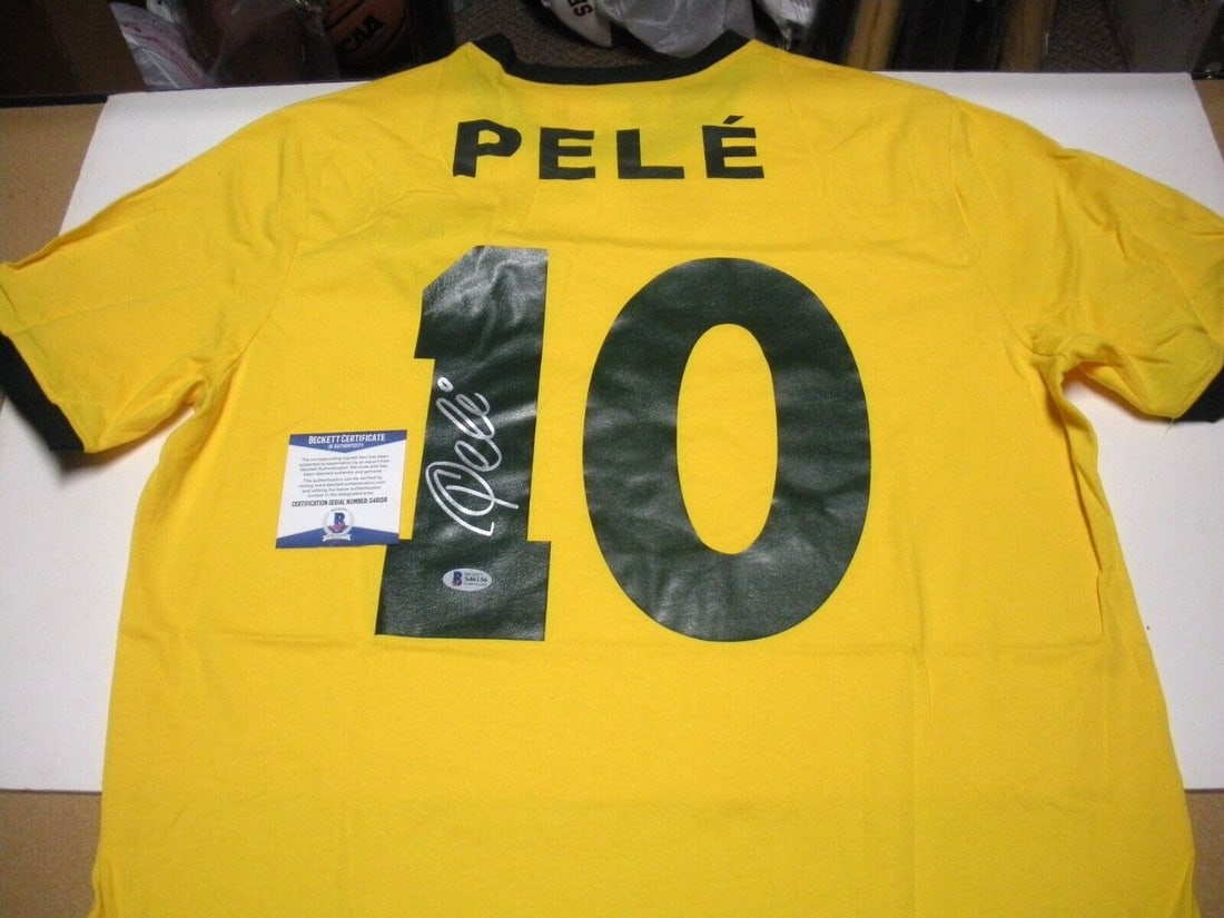 PELE BRAZIL 3X WORLD CUP CHAMP BICYCLE KICK STAR LAST1 BECKETT/COA SIGNED JERSEY: PELE BRAZIL 3X WORLD CUP CHAMP BICYCLE KICK STAR LAST1 BECKETT/COA SIGNED JERSEY Sport: Soccer Product: Jersey Original/Reprint: Original Pre-Owned While the lot images are representative of the item,