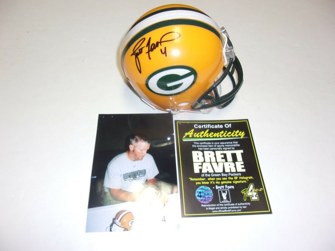 BRETT FAVRE GREEN BAY PACKERS SB CHAMPS HOF-16 FAVRE/COA SIGNED MINI HELMET: BRETT FAVRE GREEN BAY PACKERS SB CHAMPS HOF-16 FAVRE/COA SIGNED MINI HELMET Sport: Football-NFL Product: Helmet Original/Reprint: Original Autograph Type: Collectible Autographs Pre-Owned While the lo