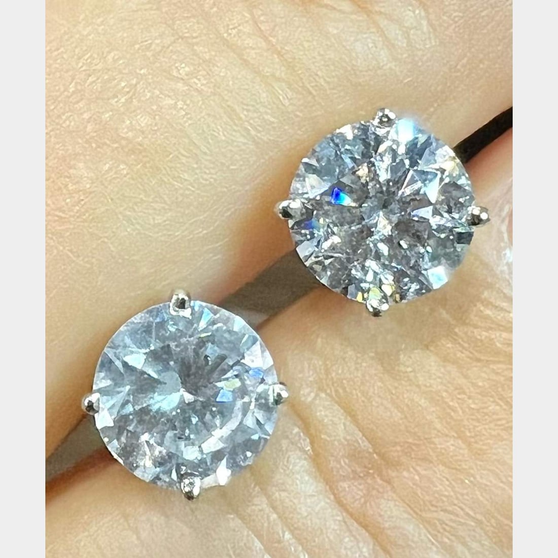 14K White Gold 2.67 Ct. Diamond Stud Earrings: 14K White Gold 2.67 Ct. Diamond Stud Earrings 14K White Gold 2.67 Ct. Diamond Stud Earrings Weighing 1.6 grams Set with 2 Diamonds weighing 2.67 Ct. H-I Color, I1-I3 Clarity Metal Color: White Apprais