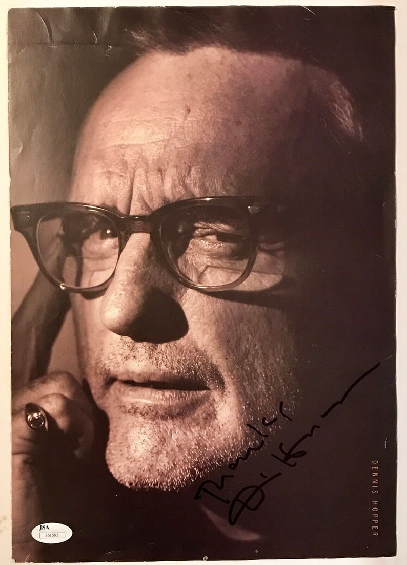 DENNIS HOPPER d.2010 (Easy Rider/ Hoosiers) signed magazine page JSA COA: DENNIS HOPPER d.2010 (Easy Rider/ Hoosiers) signed magazine page JSA COA Movie: Easy Rider Original/Reproduction: Original Object Type: Photograph Signed By: Dennis Hopper Autograph Authentication: Ja
