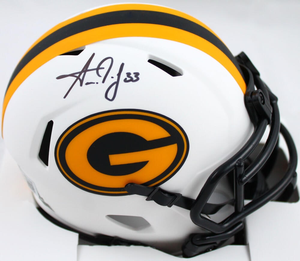 Aaron Jones Autographed Green Bay Packers Lunar Speed Mini Helmet-Beckett W Holo: Aaron Jones Autographed Green Bay Packers Lunar Speed Mini Helmet-Beckett W HoloSport: FootballProduct: HelmetOriginal/Reprint: OriginalTeam: Green Bay PackersPlayer: Aaron JonesAutograph Authenticati