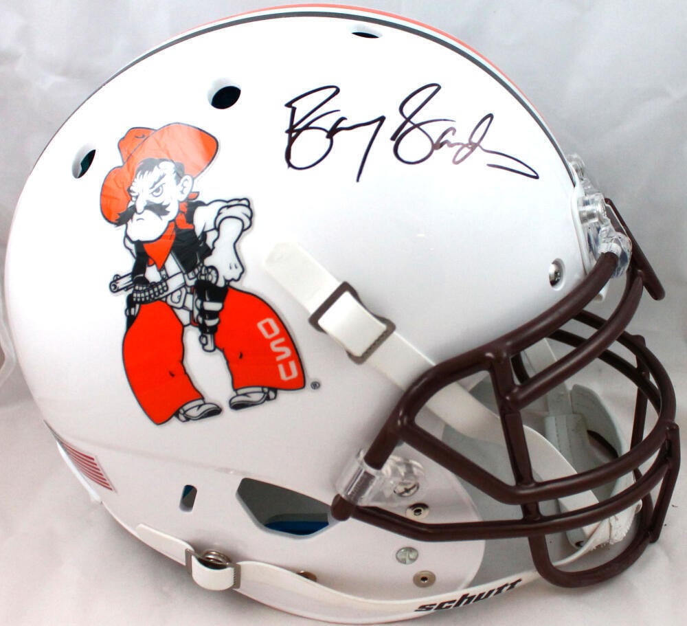 Barry Sanders Signed Oklahoma State F/S White Schutt Helmet-BAW Holo: Barry Sanders Signed Oklahoma State F/S White Schutt Helmet-BAW Holo Sport: Football Product: Helmet Original/Reprint: Original Team: Oklahoma State Cowboys Player: Barry Sanders Autograph Authenticat