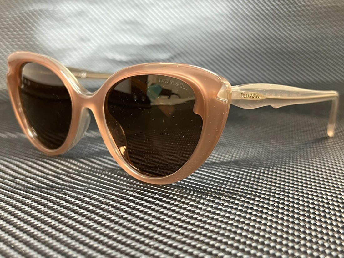 Tiffany TF4163F 82813G Opal Sand Womens Cat Eye Sunglasses 54 mm: Tiffany TF4163F 82813G Opal Sand Womens Cat Eye Sunglasses 54 mm Type: Sunglasses Frame Color: Brown Style: Cat Eye Lens Color: Brown Features: Lightweight Frame Material: Acetate Lens Material: Plast