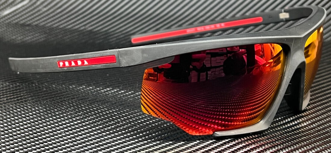 PRADA LINEA ROSSA PS 07YS DG010A Black Rubber Mens 76 mm Sunglasses: PRADA LINEA ROSSA PS 07YS DG010A Black Rubber Mens 76 mm Sunglasses Frame Color: Black Type: Sunglasses New The Mynt Guarantee: All items in this auction are guaranteed to be 100% authentic. At Your S