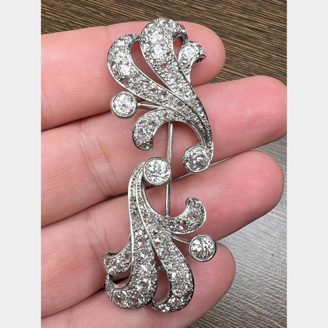 Art Deco Platinum Diamond Jabot Pin: Art Deco Platinum Diamond Jabot Pin Stone Type: Diamonds Metal Type: Platinum Other: Vintage Appraisal Price: $9500 Comments: Art Deco Platinum Diamond Jabot Pin Weighing 14.9 grams Set with 4 Europea