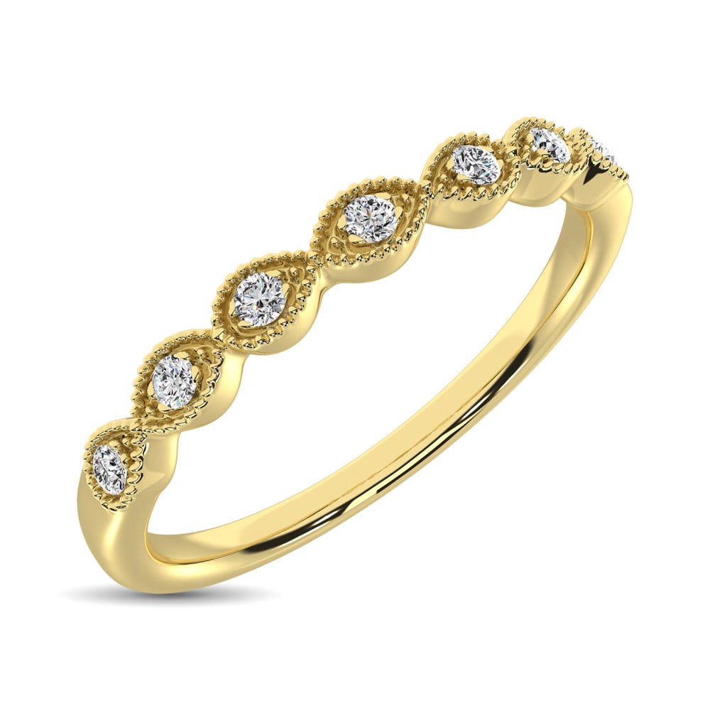 14K Yellow Gold 1/20 Ct.Tw. Diamond Stackable Band: 14K Yellow Gold 1/20 Ct.Tw. Diamond Stackable Band This Glamorous Stackable band Is Available In 14K Yellow Gold. There Are 7 Round Diamonds With A Total Carat Weight Of 1/20 Ctw Set In A Micro Prong 