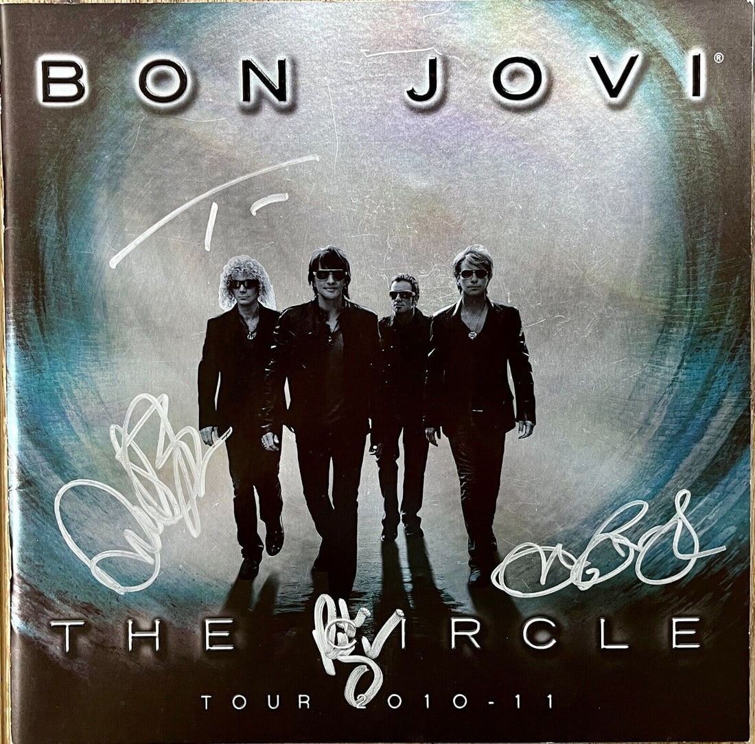 BON JOVI signed "The Circle" 2010-11 Tour Book signed by Entire Band: BON JOVI signed "The Circle" 2010-11 Tour Book signed by Entire Band Industry: Music Signed By: Jon Bon Jovi Signed: Yes Original/Reproduction: Original None While the lot images are representative of