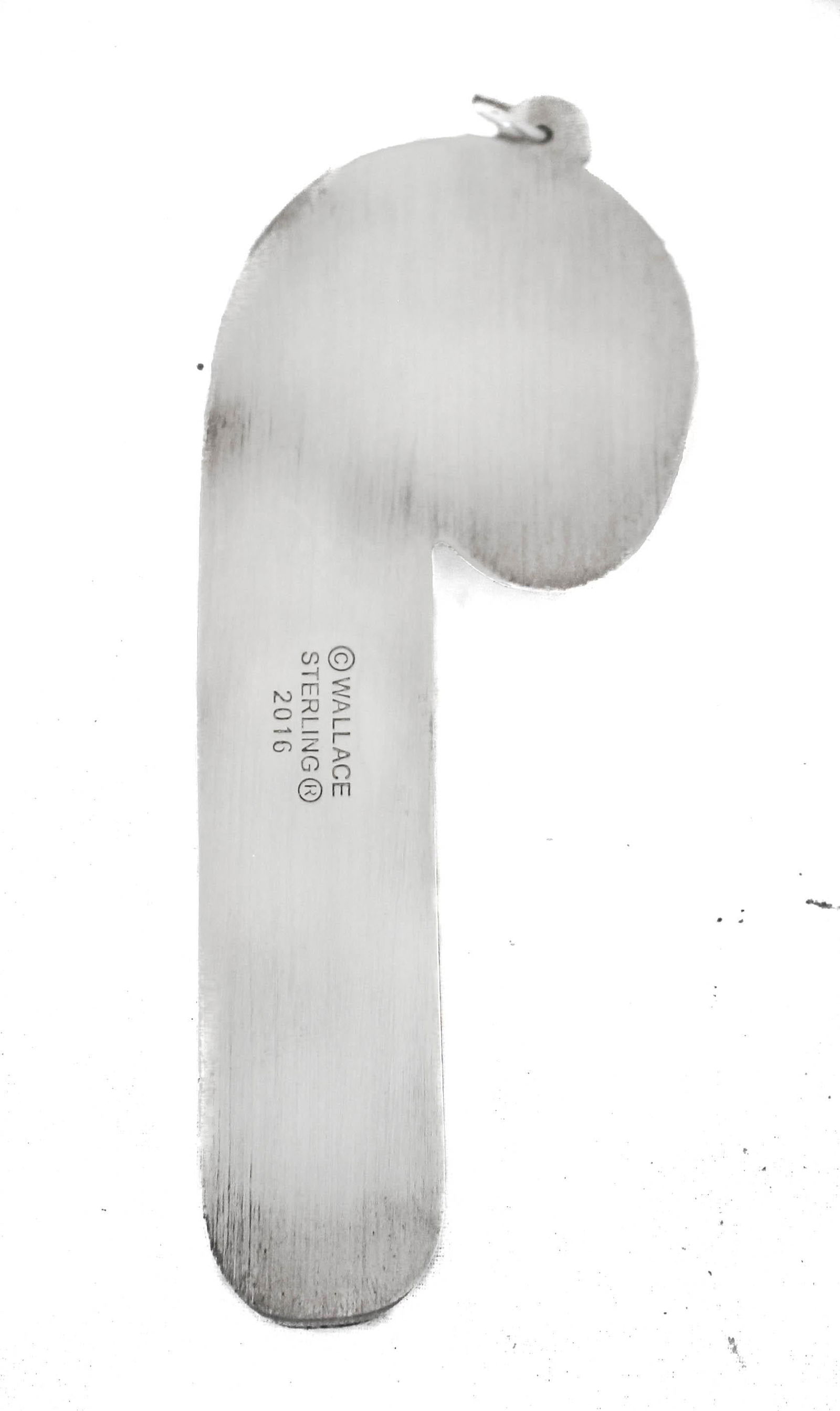 Sterling Christmas Candy Cane Ornament: Sterling Christmas Candy Cane Ornament Creator: Wallace Silversmiths (Manufacturer) Dimensions: Height: 4.5 in (11.43 cm)Diameter: 4.5 in (11.43 cm) Materials and Techniques: Sterling Silver Place of