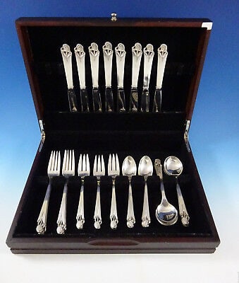 Woodlily by Frank Smith Sterling Silver Flatware Set For 8 Service 40 Pieces: Woodlily by Frank Smith Sterling Silver Flatware Set For 8 Service 40 Pieces Woodlily (glossy) by frank smith sterling silver flatware set, 40 pieces. This graceful pattern features a "danish-moderne