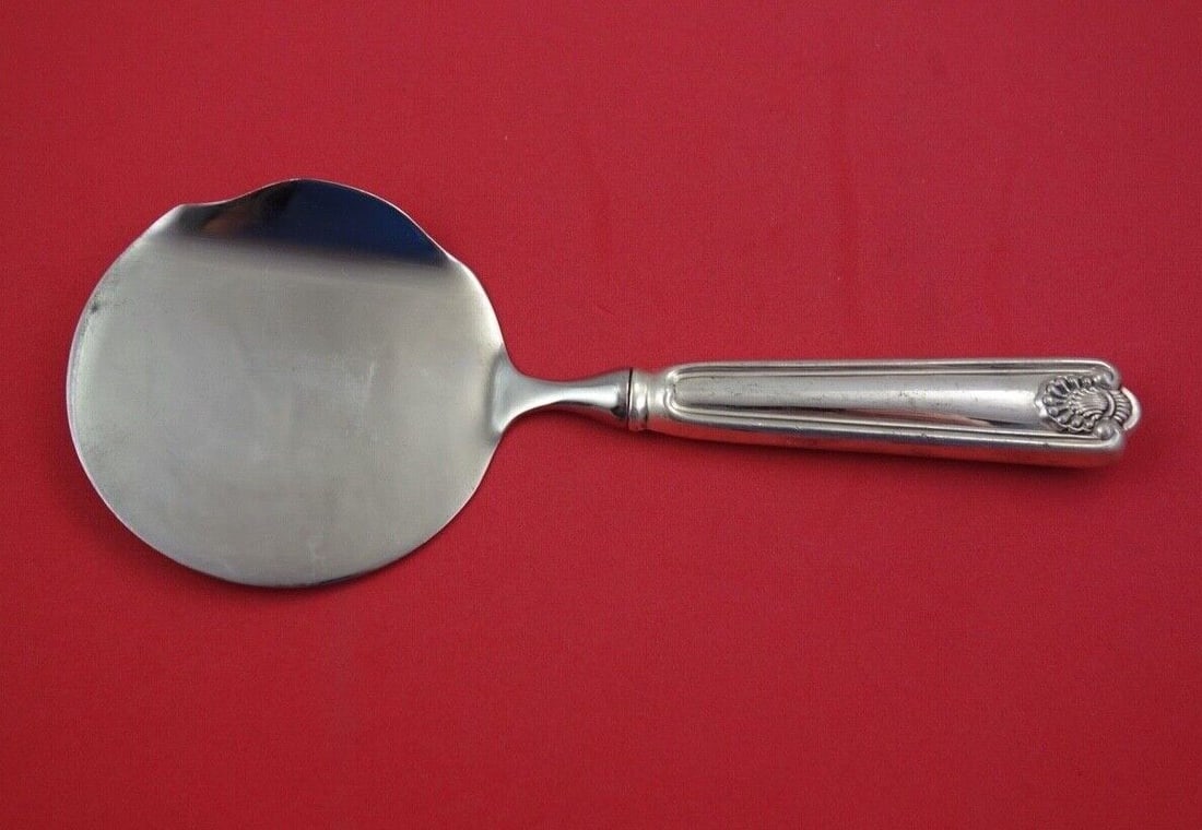 Fiddle Shell by Frank Smith Sterling Silver Tomato Server not pierced WS 8 1/2": Fiddle Shell by Frank Smith Sterling Silver Tomato Server not pierced WS 8 1/2" Fiddle shell by frank smith sterling silver cranberry or tomato server not pierced, hollow handle with stainless impleme