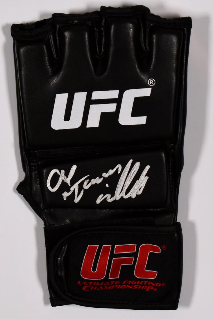 Chuck Liddell Autographed UFC Glove w/Iceman - Tristar *Silver: Chuck Liddell Autographed UFC Glove w/Iceman - Tristar *Silver Sport: Boxing Original/Reprint: Original Product: Glove(s) Player: Chuck Liddell Autograph Authentication: TRISTAR Productions Signed: Ye