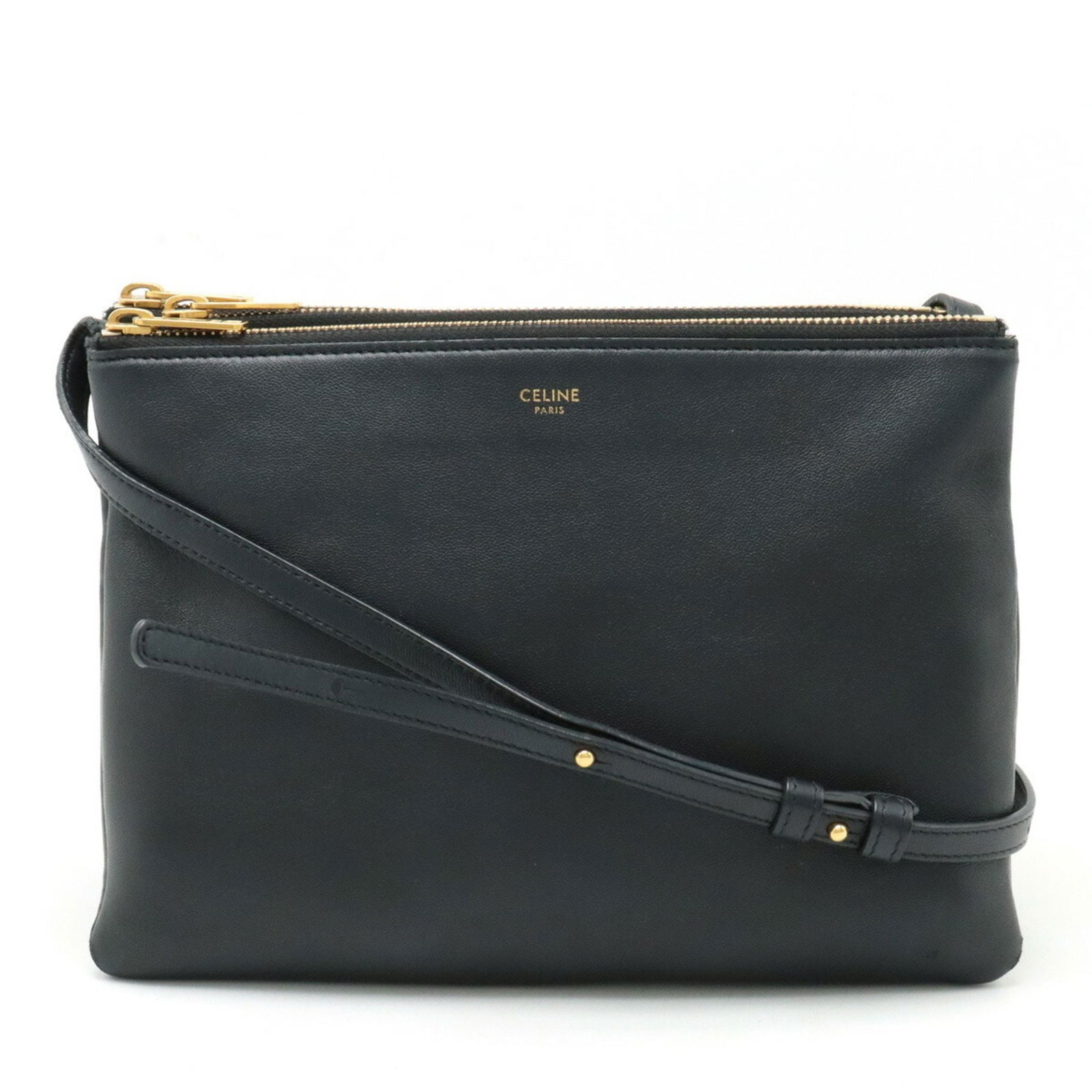 Celine Trio: Celine Trio Brand: Celine Model: Trio Color: Black Material: Leather Dimensions: 17.5cm x 24.5cm x 1cm Comments: The Celine Trio bag in black leather embodies the minimalist sophisticated aesthetic of