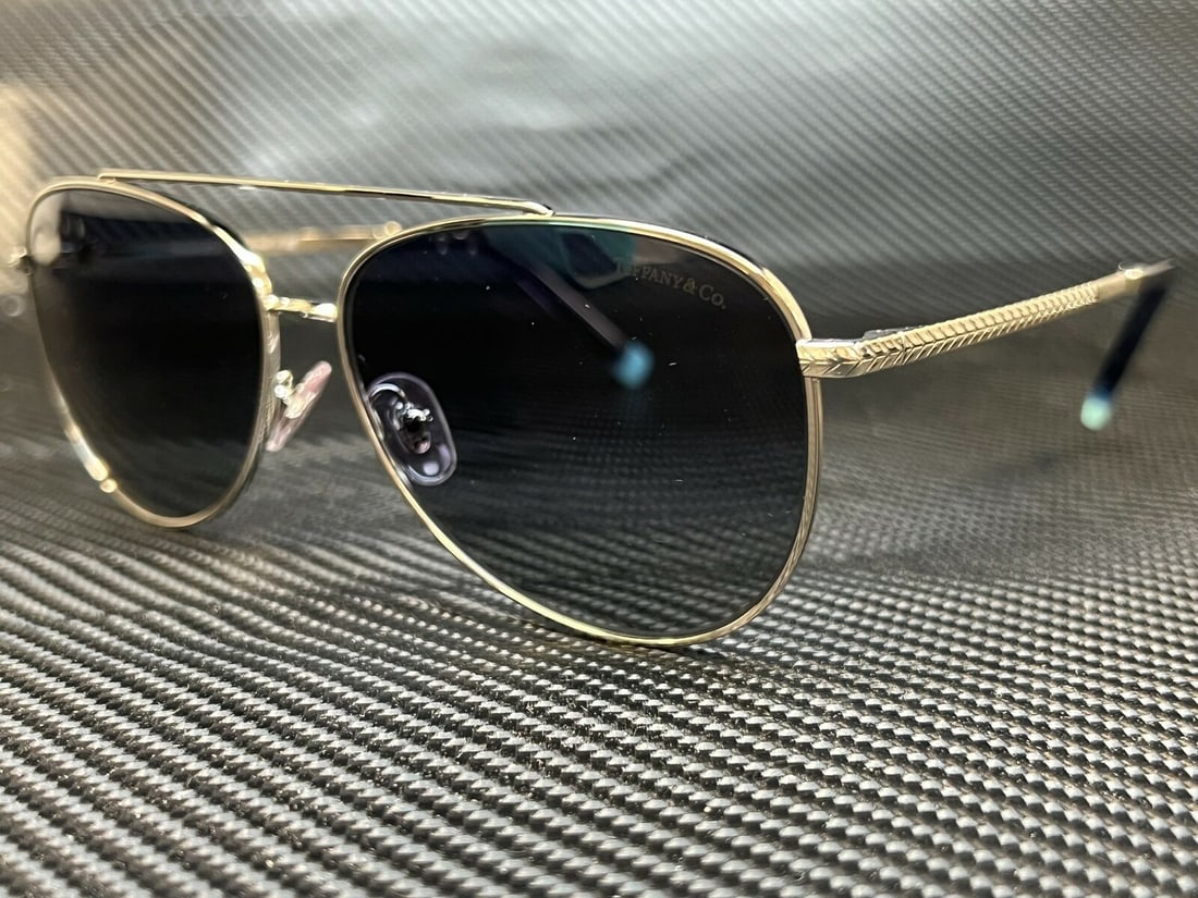 TIFFANY TF3074 61584L Silver Aviator Womens 59 mm Sunglasses: TIFFANY TF3074 61584L Silver Aviator Womens 59 mm Sunglasses Type: Sunglasses Frame Color: Silver Style: Aviator New The Mynt Guarantee: All items in this auction are guaranteed to be 100% authentic.