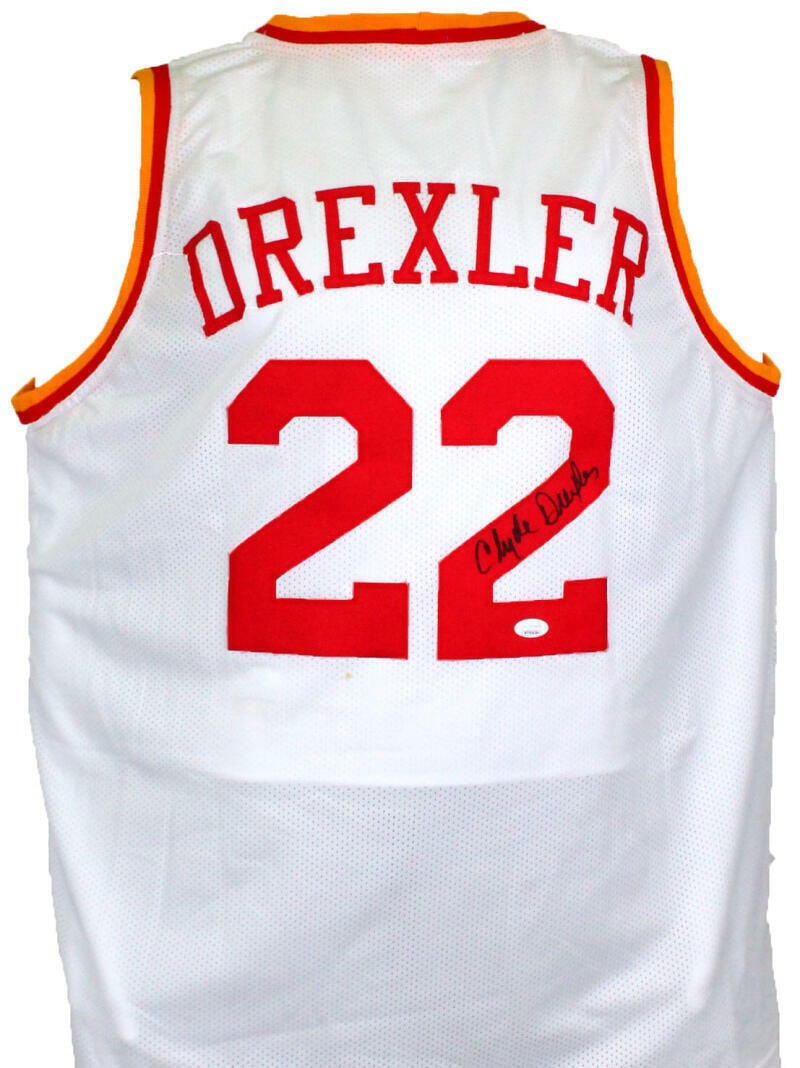 Clyde Drexler Autographed White Pro Style Jersey- JSA W *Black: Clyde Drexler Autographed White Pro Style Jersey- JSA W *Black Sport: Basketball Product: Jersey Original/Reprint: Original Player: Clyde Drexler Autograph Authentication: James Spence (JSA) Signed: Y