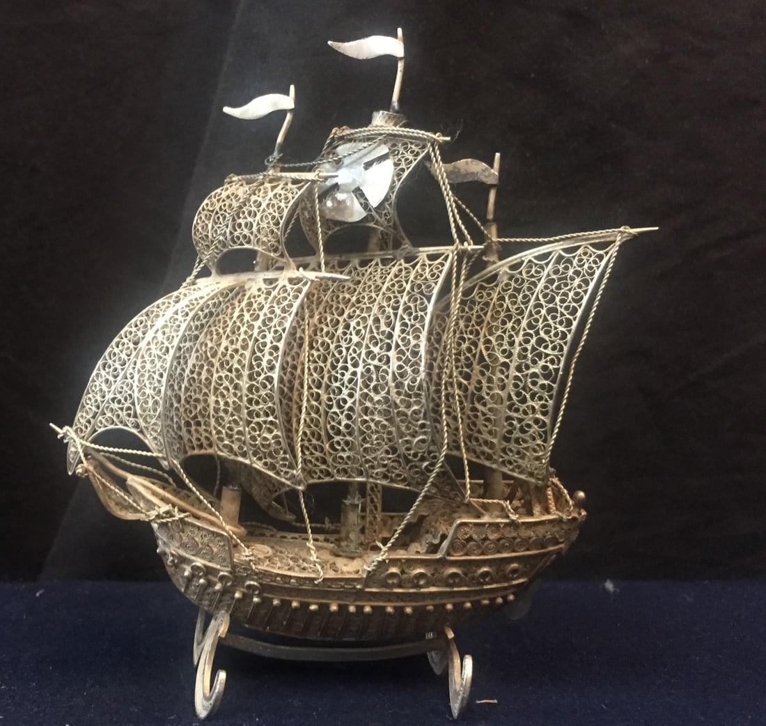 Filigree Miniature 800 Silver Ship: Filigree Miniature 800 Silver Ship Age: 1920's Pattern: Repousse Type: Miniatures This vintage hand crafted Continental silver miniature dates from the early 20th century. It is an 800 silver work of 