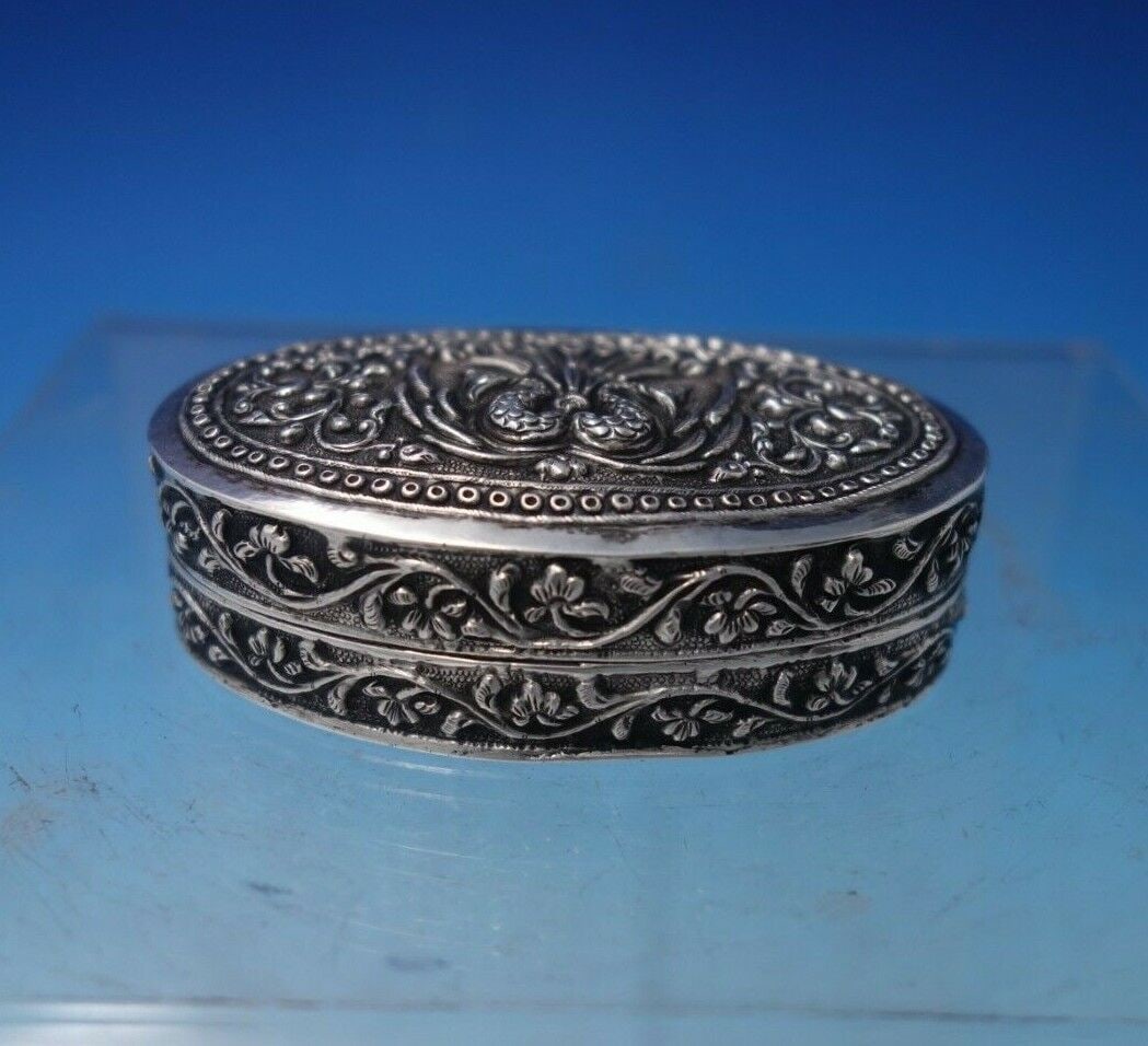 Sterling Silver European Pill Box with Peacock Motif 2 1/2" x 1 1/2": Sterling Silver European Pill Box with Peacock Motif 2 1/2" x 1 1/2" Beautiful european pill box with peacock motif (maker unknown). This box measures 7/8" tall x 2 1/2" x 1 1/2". It is not monogramme