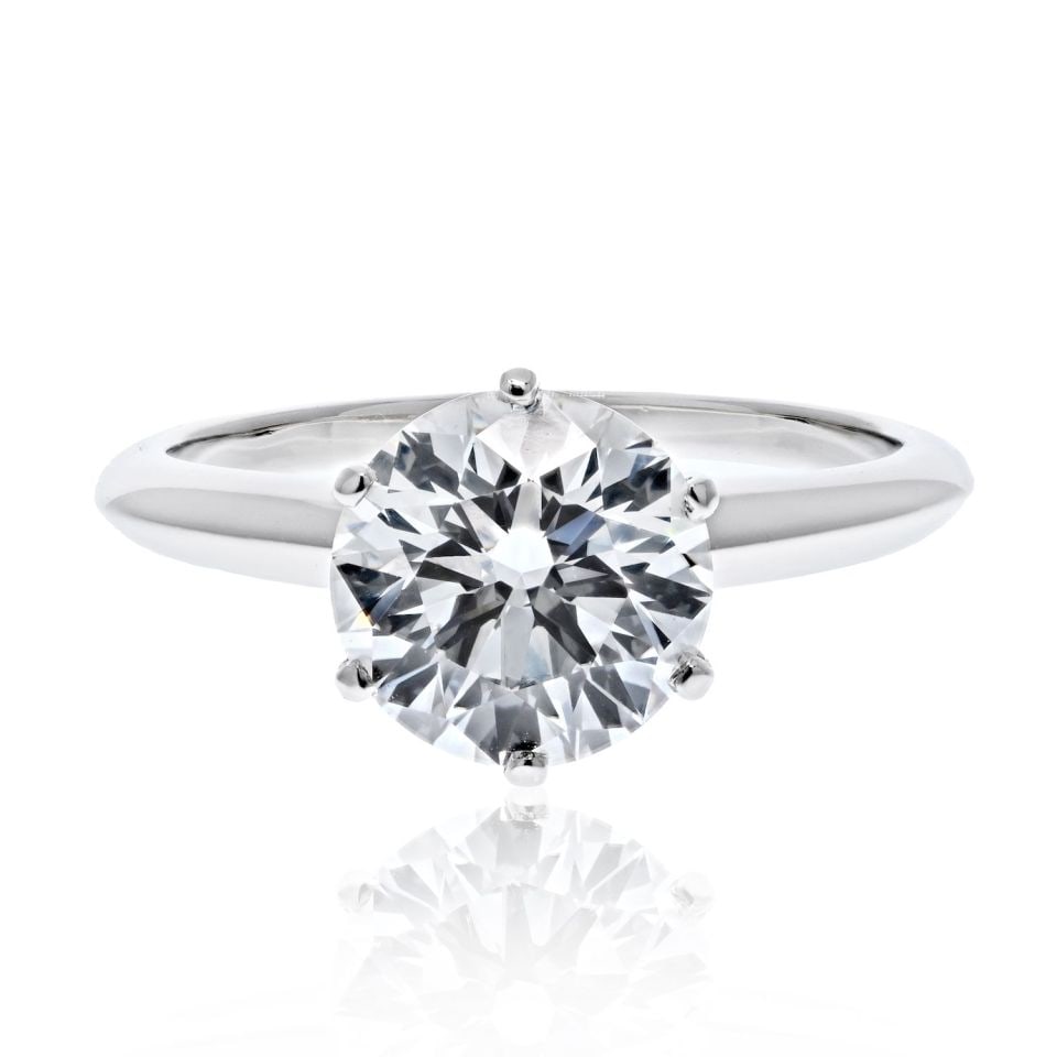 Tiffany & Co. 2.11 Carat F color VVS2 clarity Six Prong Solitaire Ring: Tiffany & Co. 2.11 Carat F color VVS2 clarity Six Prong Solitaire Ring Type: Engagement Rings Metal: Platinum Exact Diamond Weight: 2.11 Cts Condition: Excellent. Signed By: Tiffany & Co. Brand: Tiffa