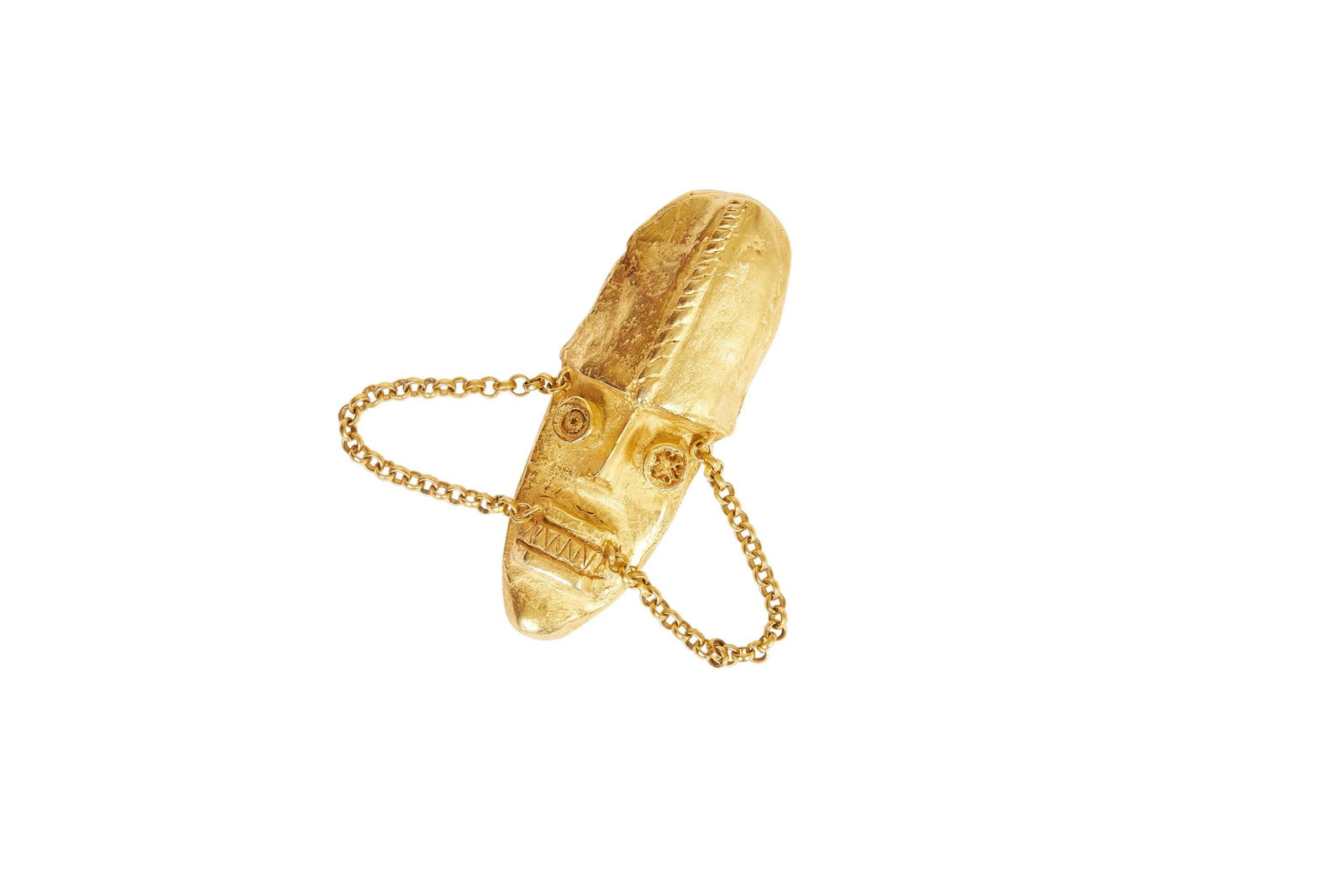DKNY 90s Totem Mask Pin Brooch: DKNY 90s Totem Mask Pin Brooch Designer: Donna Karan Brand: Donna Karan Dimensions: Height: 3.5 in (8.89 cm)Width: 1.25 in (3.18 cm) Place of Origin: United States Period: 1990-1999 Pre-Owned The Mynt