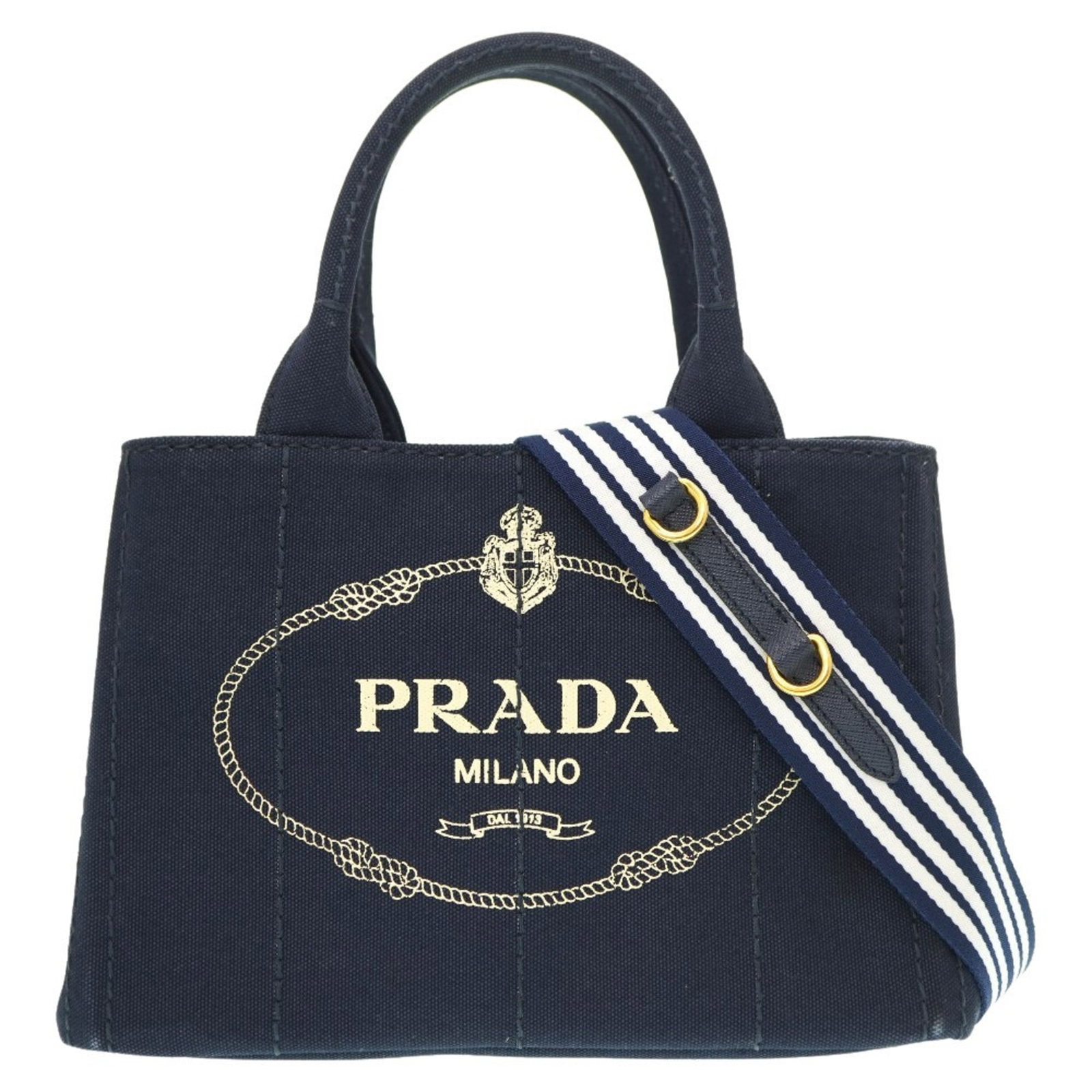 Prada Canapa 1BG439 Shoulder Tote Bag Canvas Navy Stripe 0036PRADA with Strap 6A0036GE5: Prada Canapa 1BG439 Shoulder Tote Bag Canvas Navy Stripe 0036PRADA with Strap 6A0036GE5 Brand: Prada Line: Canapa Model: 1BG439 Country of Origin: Italy Type: Tote bag Material: Canvas Canvas: Color: 
