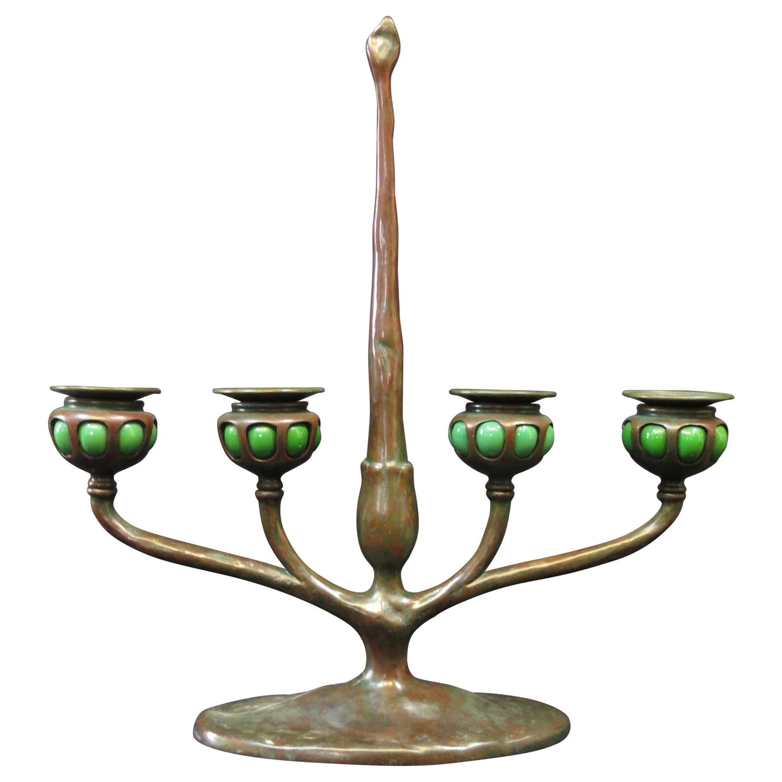 Tiffany Studios Four Place Candelabra with Blown Out Green Glass Candleholders: Tiffany Studios Four Place Candelabra with Blown Out Green Glass Candleholders Creator: Tiffany Studios (Maker) Dimensions: Height: 15 in (38.1 cm)Width: 14.07 in (35.74 cm)Depth: 4.13 in (10.5 cm) St